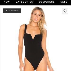 Free People Tops - Free people body suit NEVER WORN Free People Tops - Free people body suit NEVER WORN